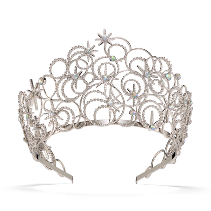 Silver tiara with intricate design and embedded stones on a white background